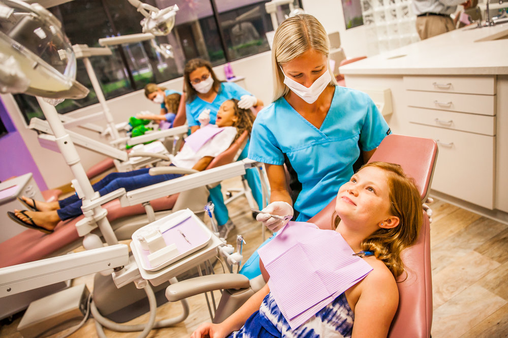 Photo of patients with hygienist 